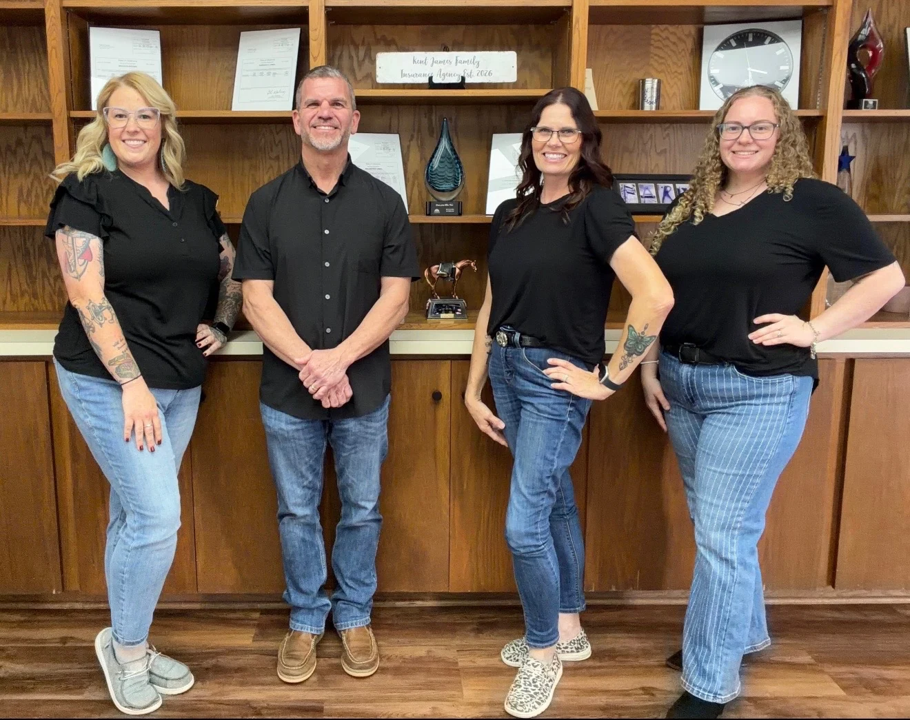 Kent, Viki, Terrance, and Madison together inside the Lawton office