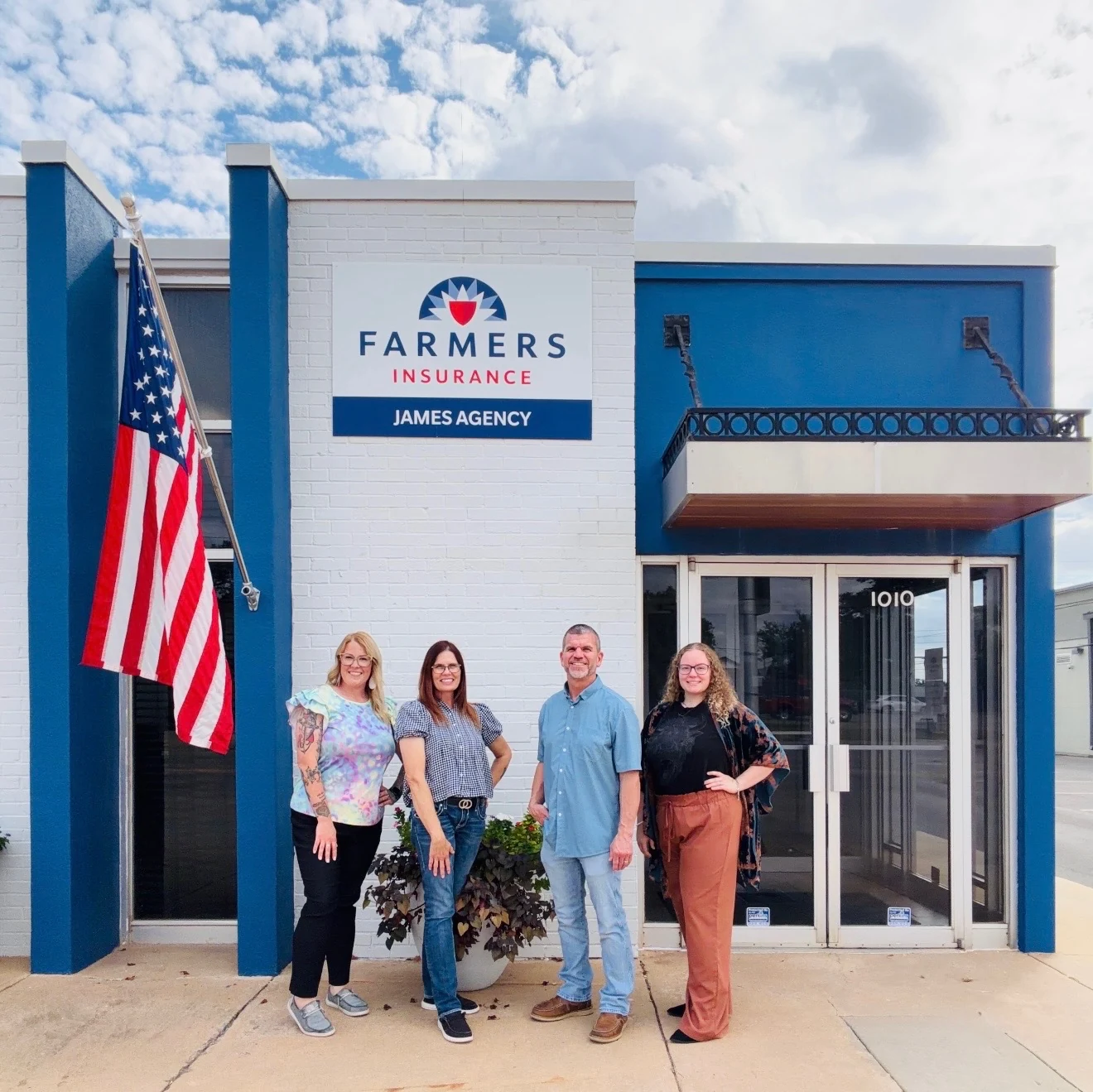 Our four-person team outside the Farmers Insurance James Agency office at 1010 SW C Avenue